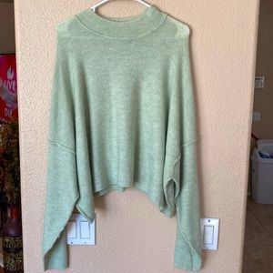 Cropped mint green cotton long sleeve top